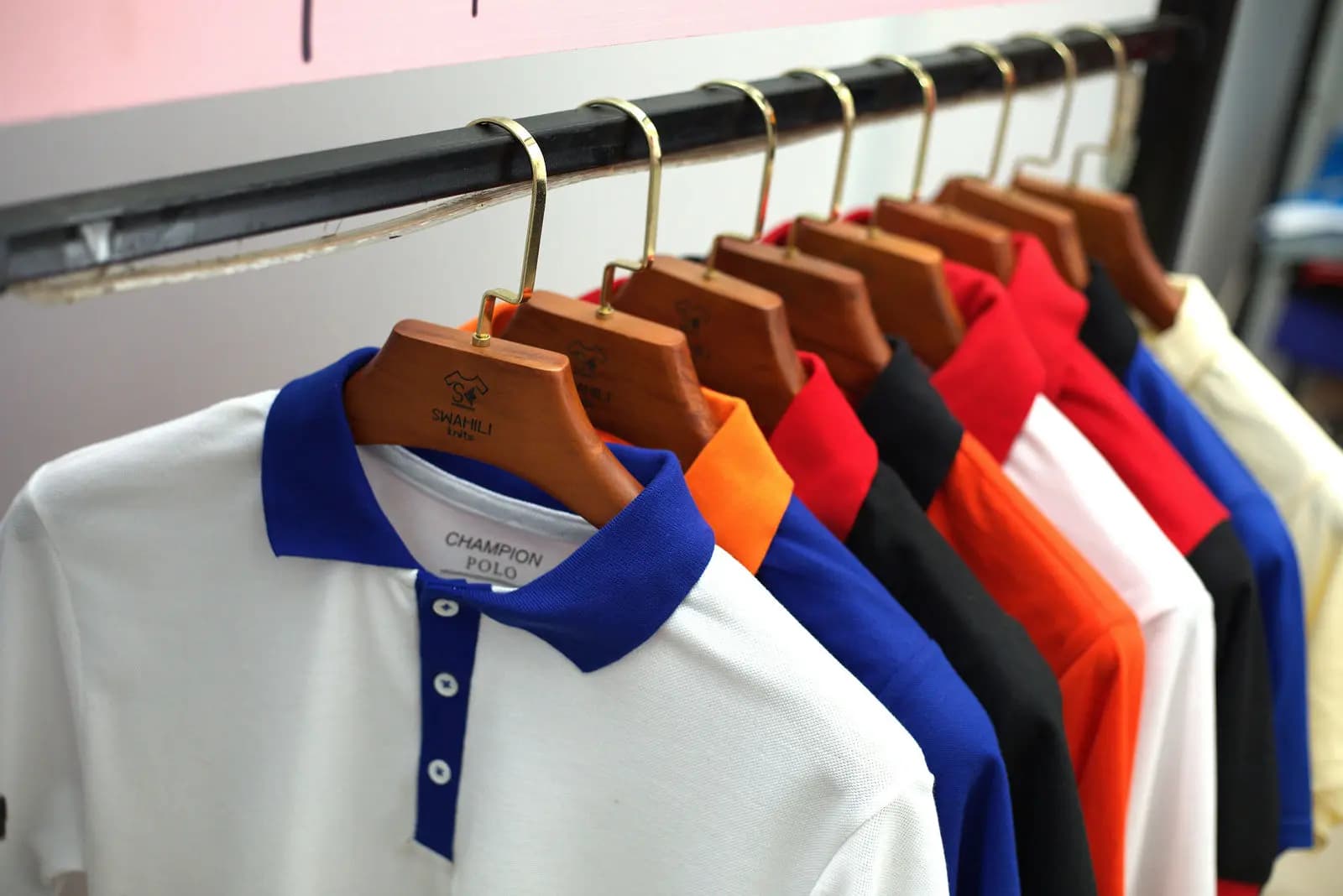 Pique polo shirts with contrast collars on the rail