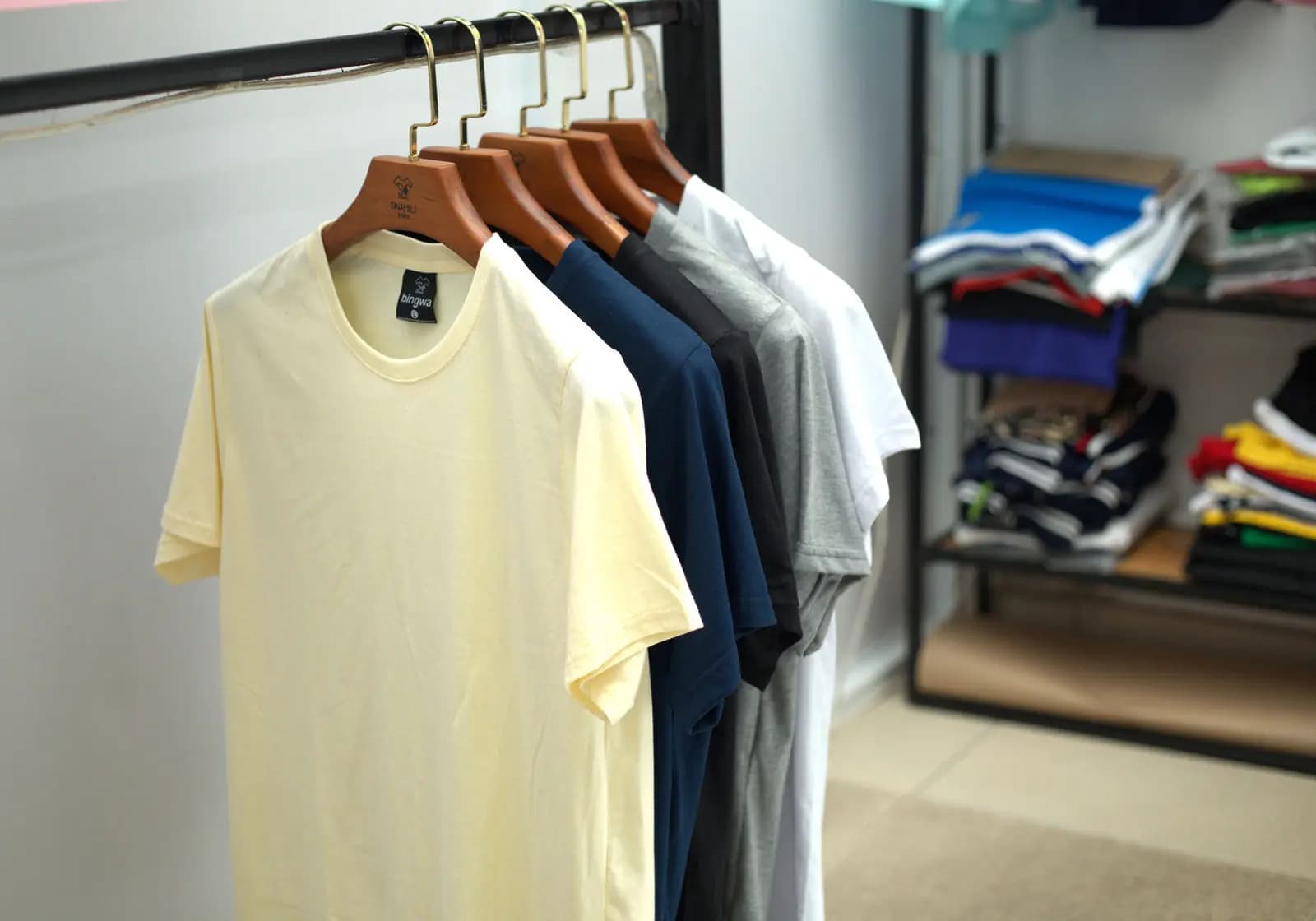 T-shirts in a range of colours on the rail